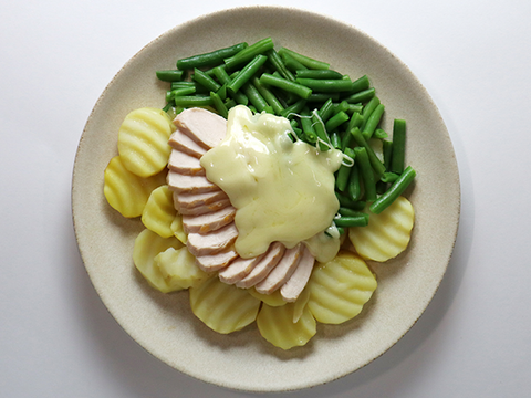 Kartoffeln mit Pouletbrust, Bohnen und Käse