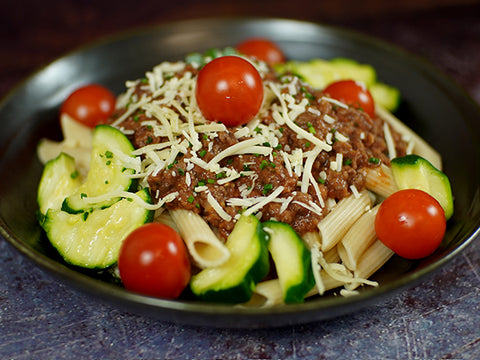 Vollkornspiralen an Bolognese, Gemüse und Käse