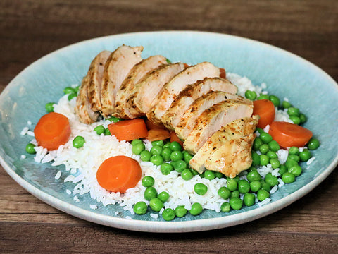 Pouletbrust auf Reis mit Gemüse