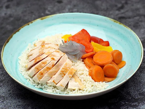 Reis mit Pouletbrust und Gemüse